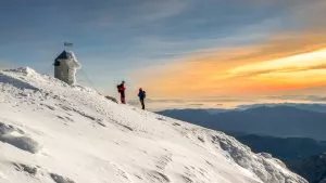 Sunrise on top of Triglav in winter
